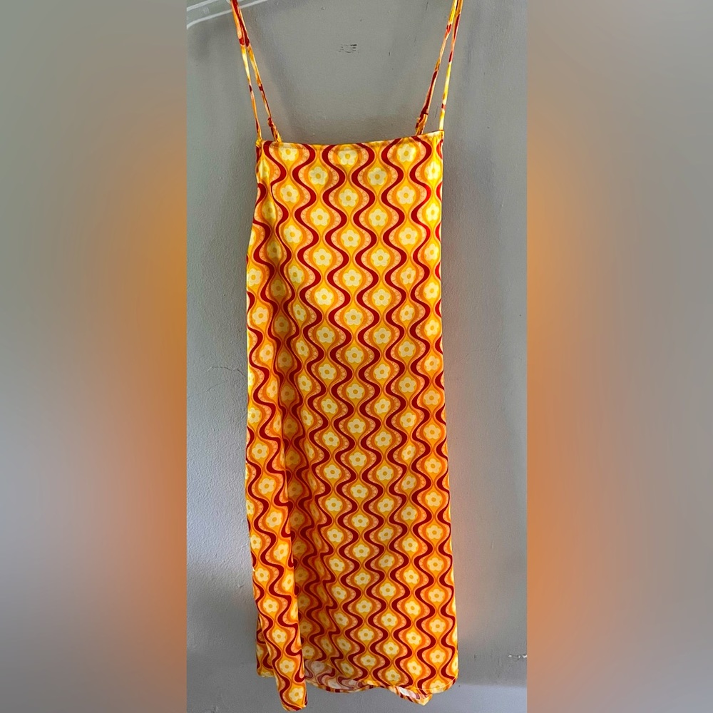 Vibrant colors. Completely New, Never Used, Open Back, dress molds to your body